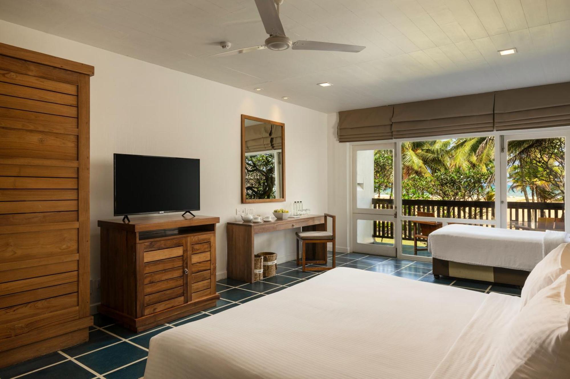 Family Room Sea View at Center Point Black Coral & at Seaside Social restaurants