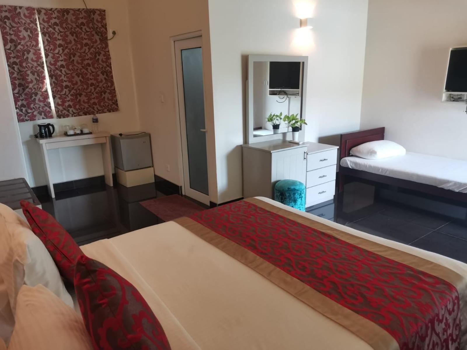 Deluxe Triple Room