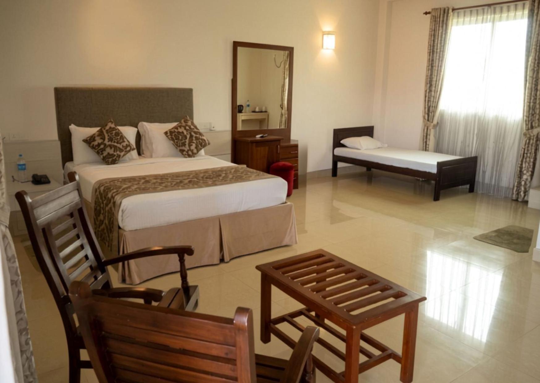 Deluxe Triple Room